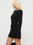 side view of model wearing Princess Polly Carters Long Sleeve Mini Dress Black High Neck 