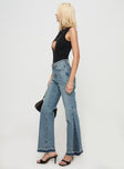 side view of model wearing Princess Polly Farleigh Flare Jeans Blue High Waisted 