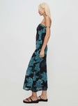 side view of model wearing Princess Polly Celik Maxi Dress Black / Blue Floral Straight Neck 