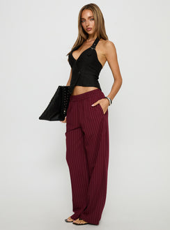 side view of model wearing Princess Polly Jaysa Baggy Wide Leg Pant Burgundy Pinstripe Mid Rise Pants 