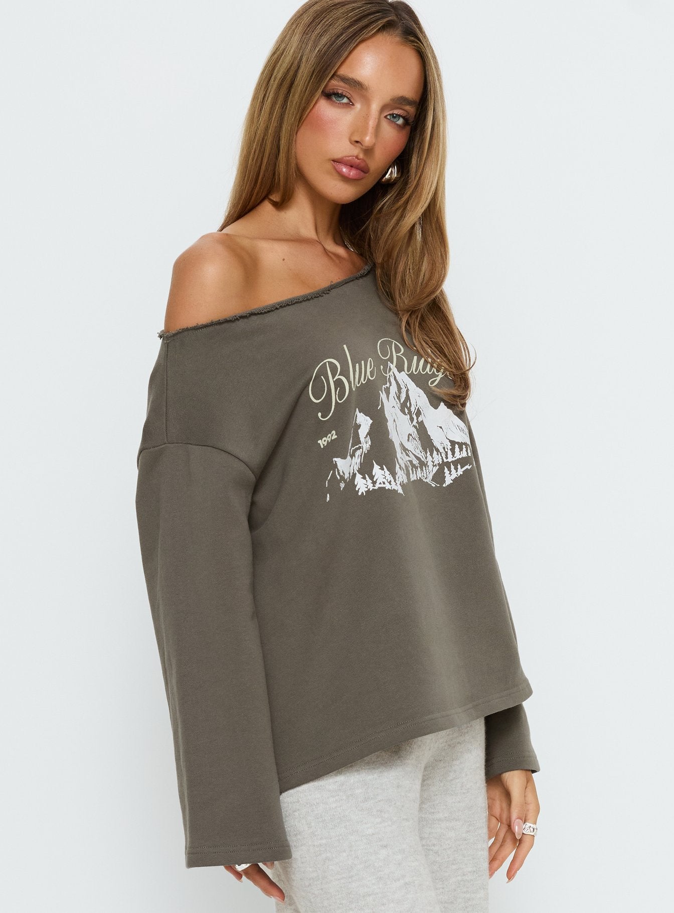 side view of model wearing Princess Polly Blue Ridge Mountains Off Shoulder Graphic Sweater Grey 