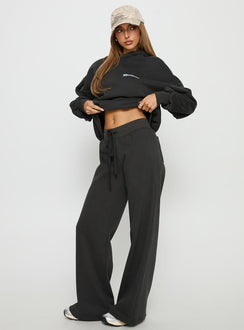 side view of model wearing Princess Polly Princess Polly Stargirl Wide Leg Sweat Pants Charcoal High Rise Pants 