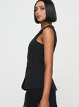 side view of model wearing Princess Polly Islington Top Black Sleeveless Crew Neck 