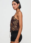 Front view of model wearing  front Princess Polly Sleeveless Plunger  Mariah Top Leopard