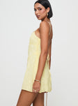 side view of model wearing Princess Polly South Of France Mini Dress Yellow Square Neck 