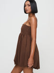 side view of model wearing Princess Polly Layken Bubble Hem Mini Dress Chocolate Square Neck 