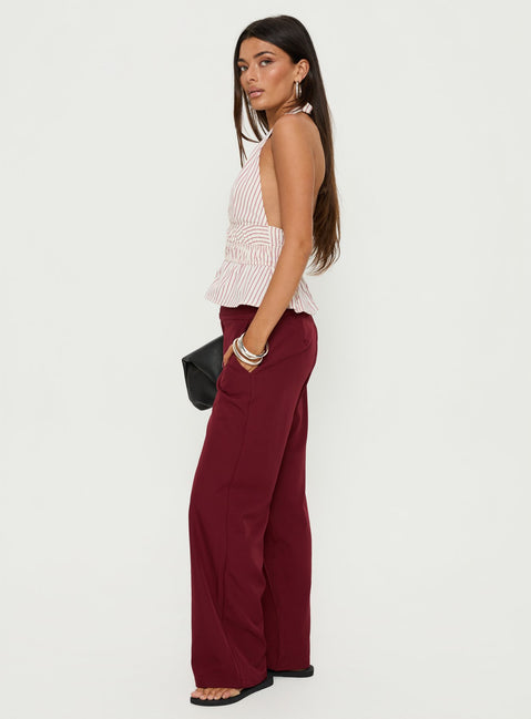 side view of model wearing Princess Polly Good Riddance Pleat Tie Slouch Pants Burgundy Mid Rise Pants 