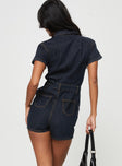 Dark wash denim romper Classic collar, button fastening at front, twin chest & hip pockets, belt looped waist, back pockets