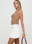   side view of model wearing Princess Polly Neddy Bubble Hem Mini Skirt White Mini Skirts 