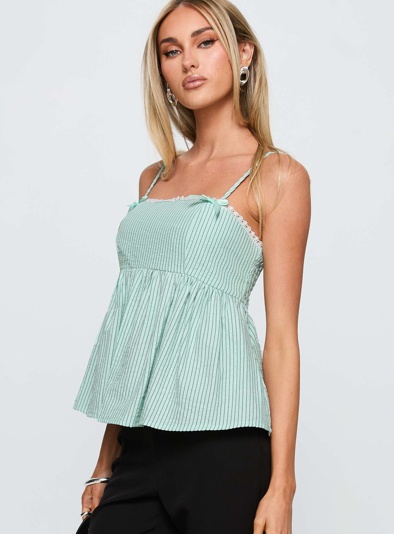 side view of model wearing Princess Polly Peace Of Mind Top Green Stripe Sleeveless Square Neck 