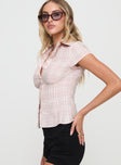 side view of model wearing Princess Polly Cottesloe Blouse Top Pink Check Short Sleeves V-Neck 