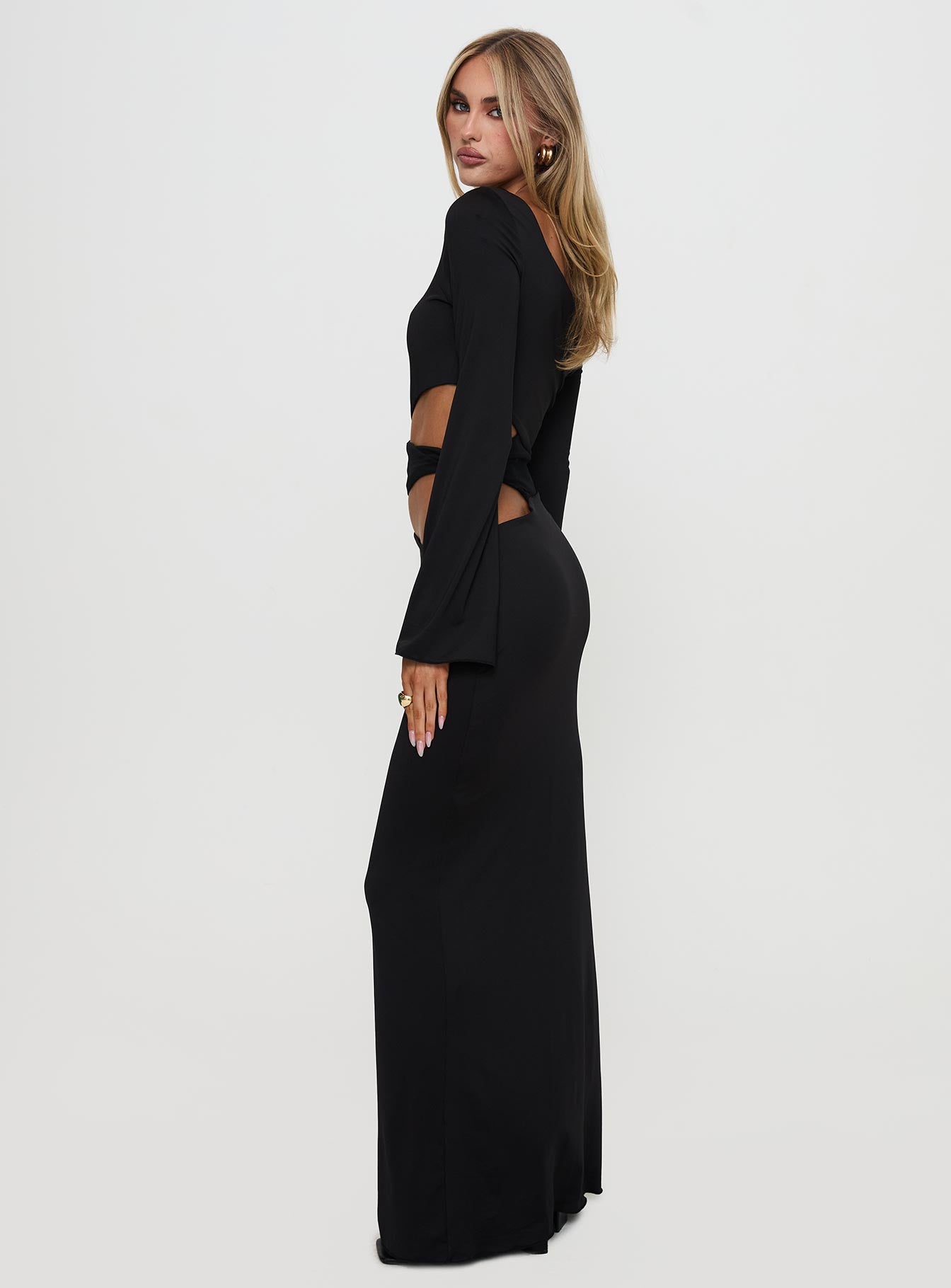 side view of model wearing Princess Polly Kazimier Long Sleeve Maxi Dress Black Asymmetric Neckline 