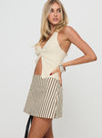 Mid-rise skort Invisible zip fastening at back, built-in shorts, slit at side Non-stretch, fully lined