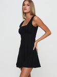 side view of model wearing Princess Polly Dasha Mini Dress Black Square Neck 