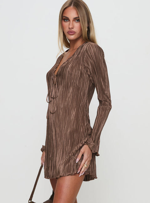 side view of model wearing Princess Polly Malop Long Sleeve Mini Dress Chocolate Petite V-Neck 