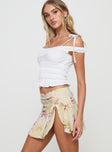   side view of model wearing Princess Polly Sassie Mini Skirt Floral Mini Skirts 