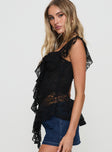 side view of model wearing Princess Polly Francia Frill Top Black Short Sleeves Square Neck 