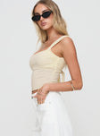 side view of model wearing Princess Polly Francois Backless Top Cream Sleeveless Square Neck 