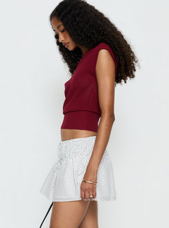   side view of model wearing Princess Polly Nomi Mini Skirt White Polka Dot Mini Skirts 