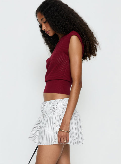   side view of model wearing Princess Polly Nomi Mini Skirt White Polka Dot Mini Skirts 