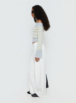 side view of model wearing Princess Polly Hereos Mid Rise Baggy Leg Jeans White Mid Rise Jeans 