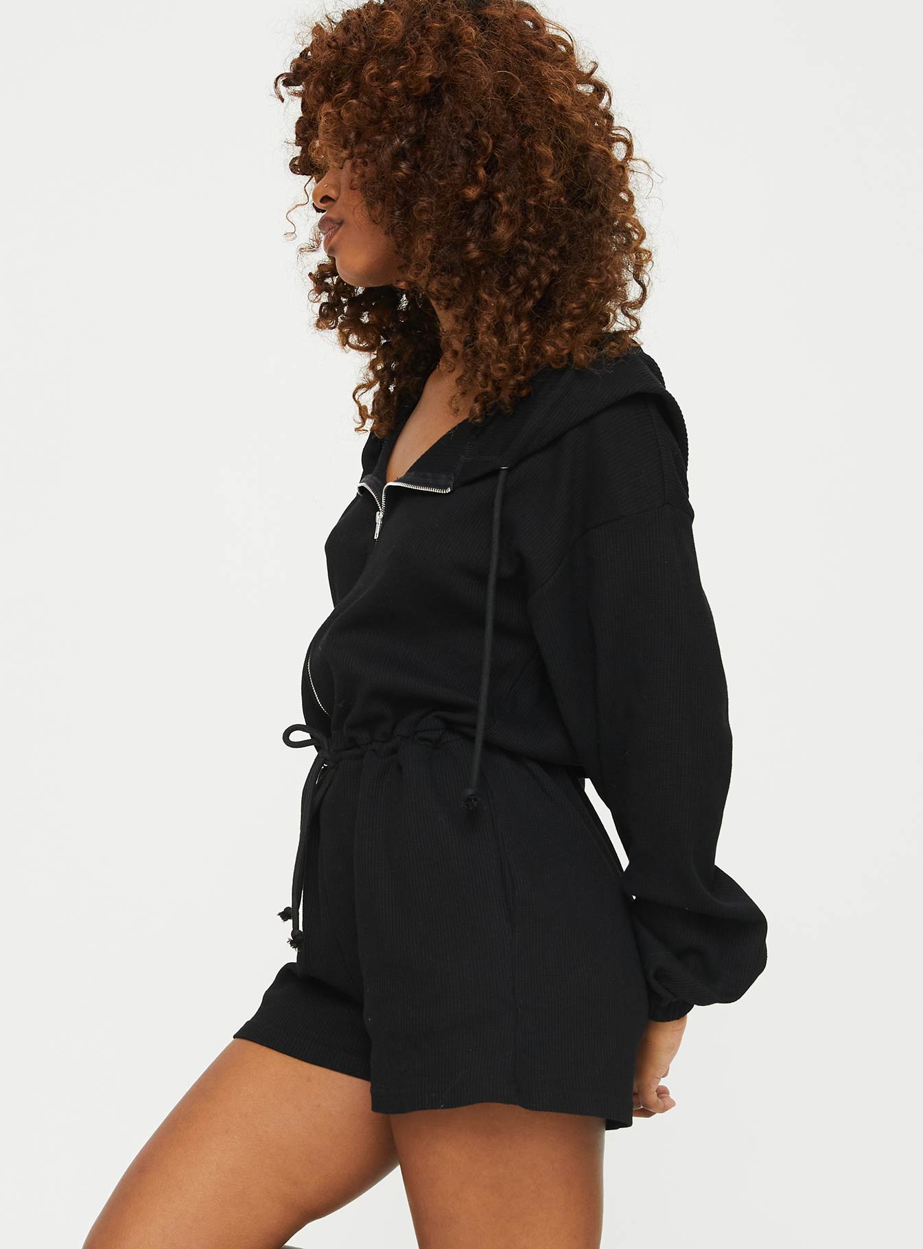 Hooded playsuit Zip fastening at front, drawstring waist, tie fastening, elasticated cuffs, twin hip pockets Slight stretch, unlined 