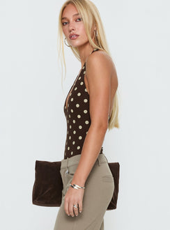 side view of model wearing Princess Polly Someone New Halter Bodysuit Chocolate Polka Sleeveless 