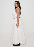   side view of model wearing Princess Polly Cherry On Top Maxi Skirt White Floral Curve Maxi 