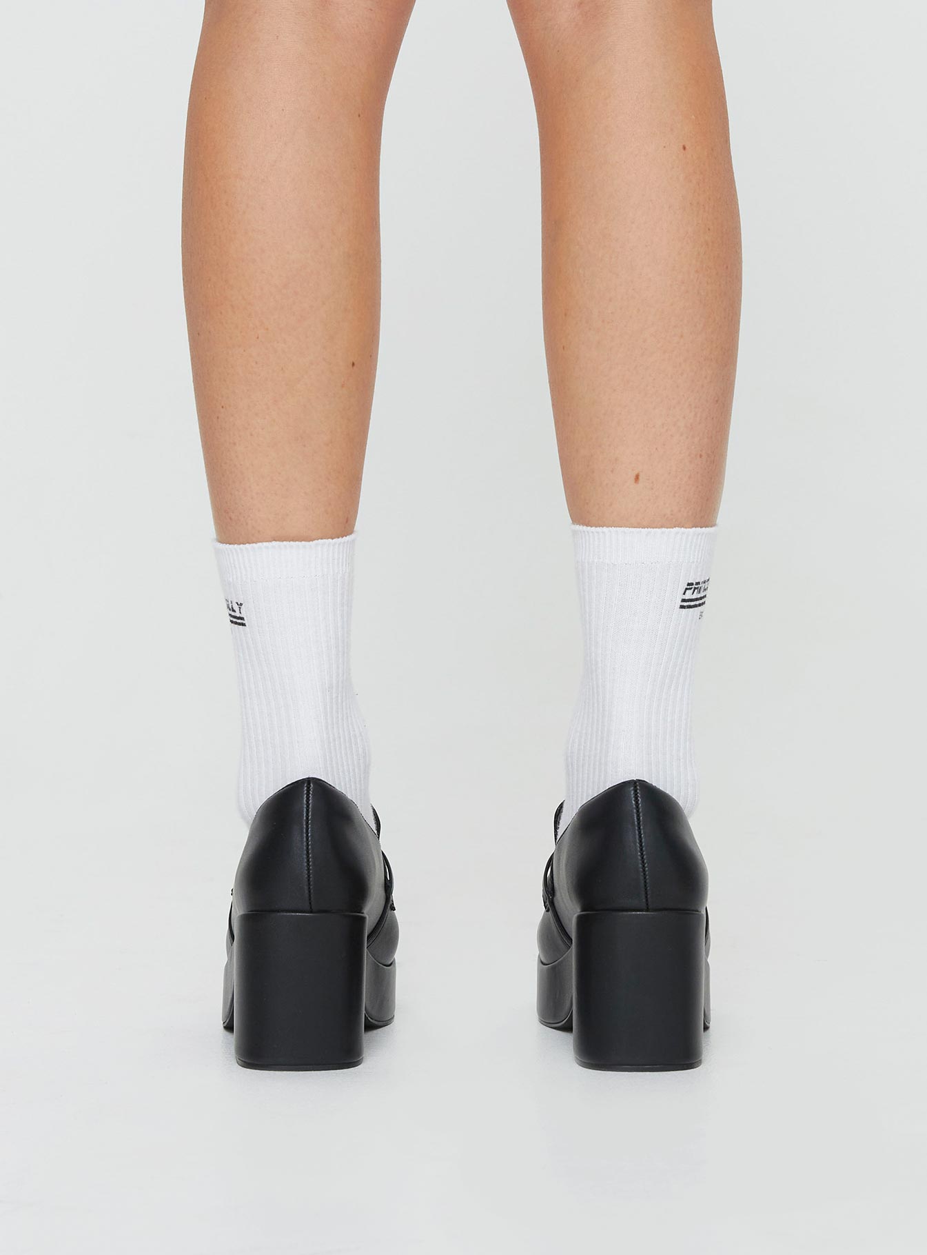 Faux leather platform loafers Slip-on design, padded footbed, treaded sole, rounded toe