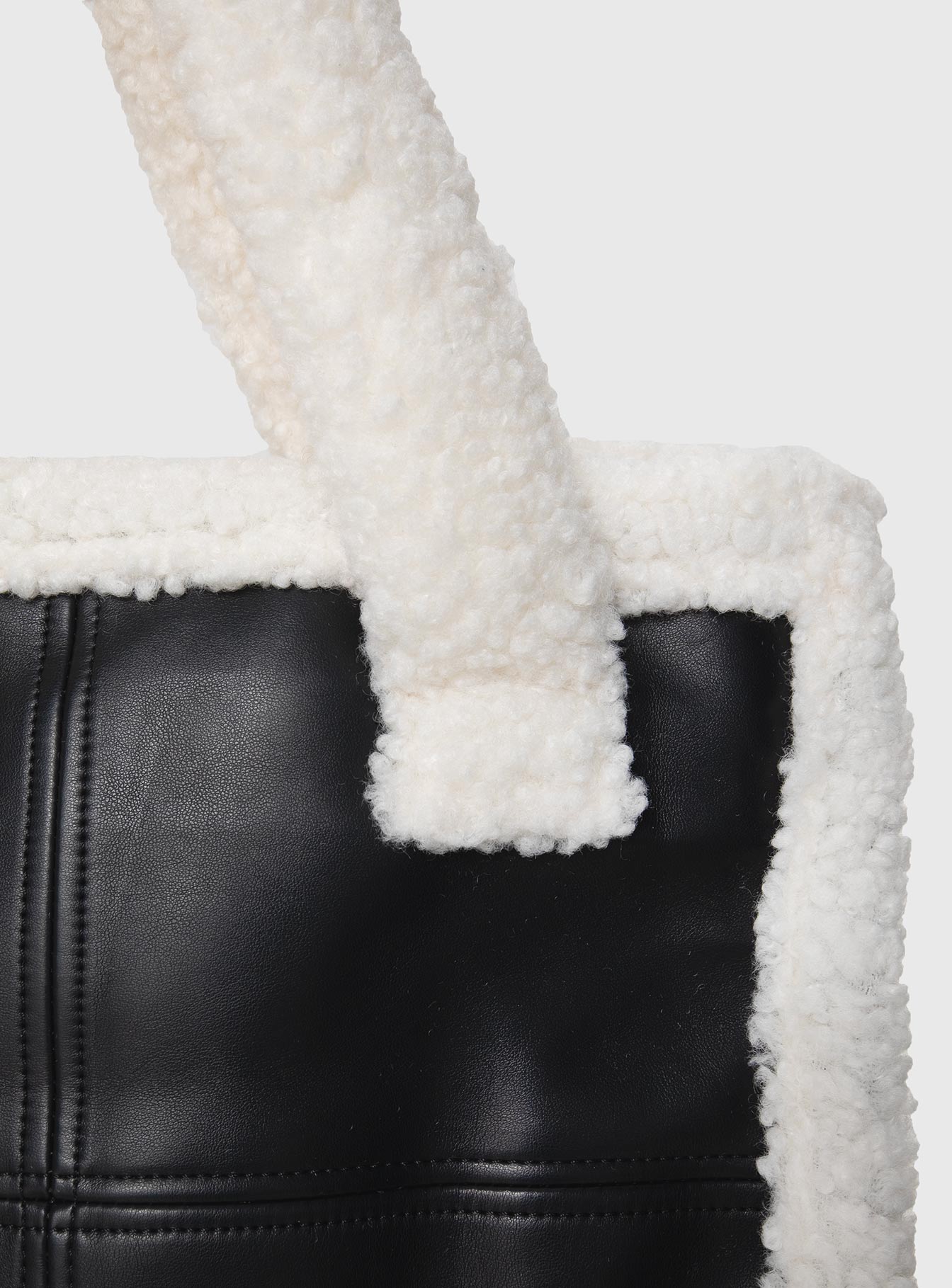 Faux leather tote bag   Fixed shoulder straps, fleece lining and trims, flat base