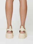 Strappy sandals Rounded toe, strappy upper, buckle fastening at ankle, platform base, treaded sole