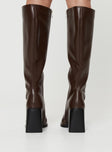 Faux leather knee-high boot Square toe, block heel, zip fastening at side, padded footbed