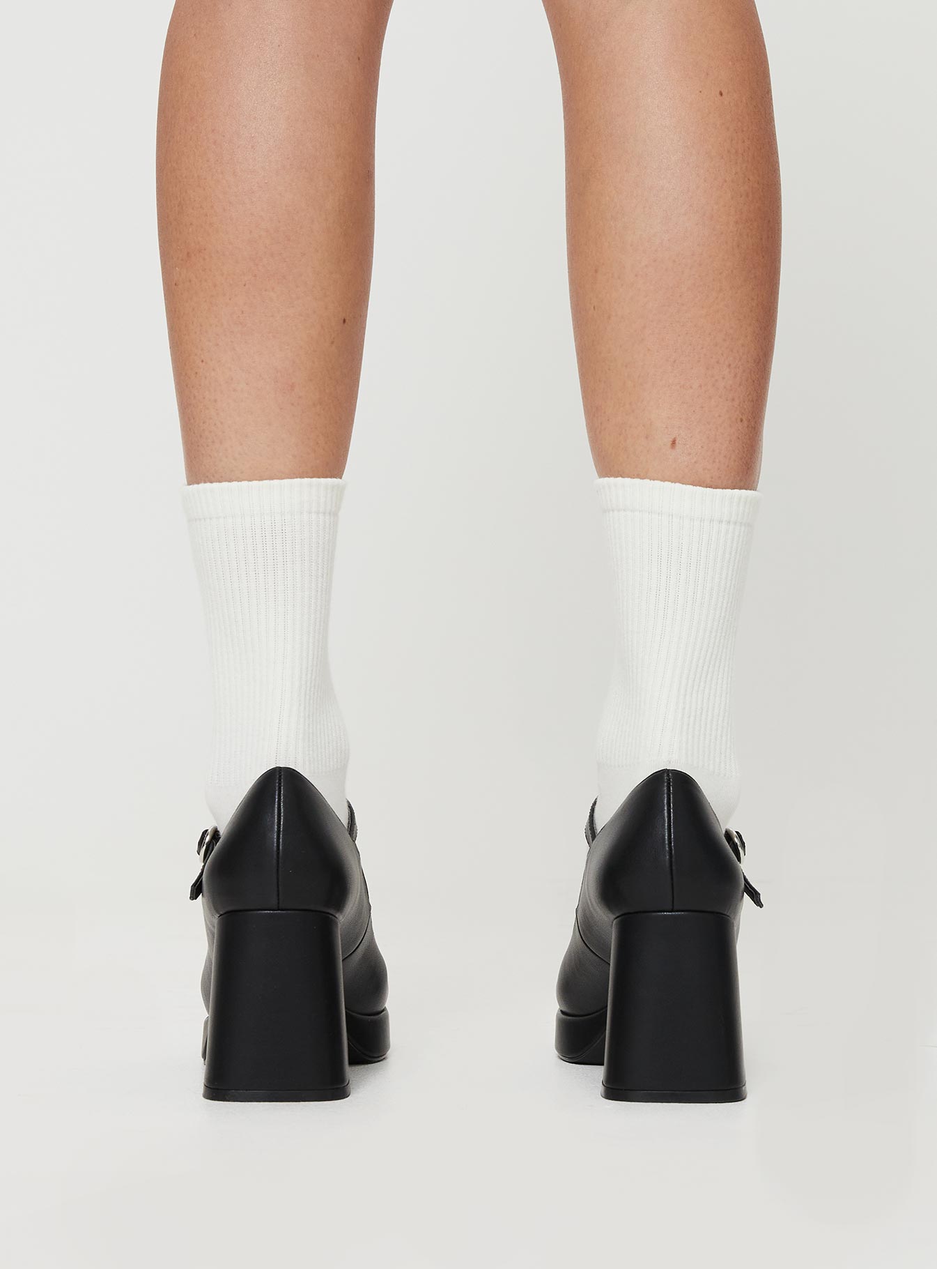 Faux leather loafer heels Single strap upper, silver-toned hardware, block heel, platform base, rounded toe