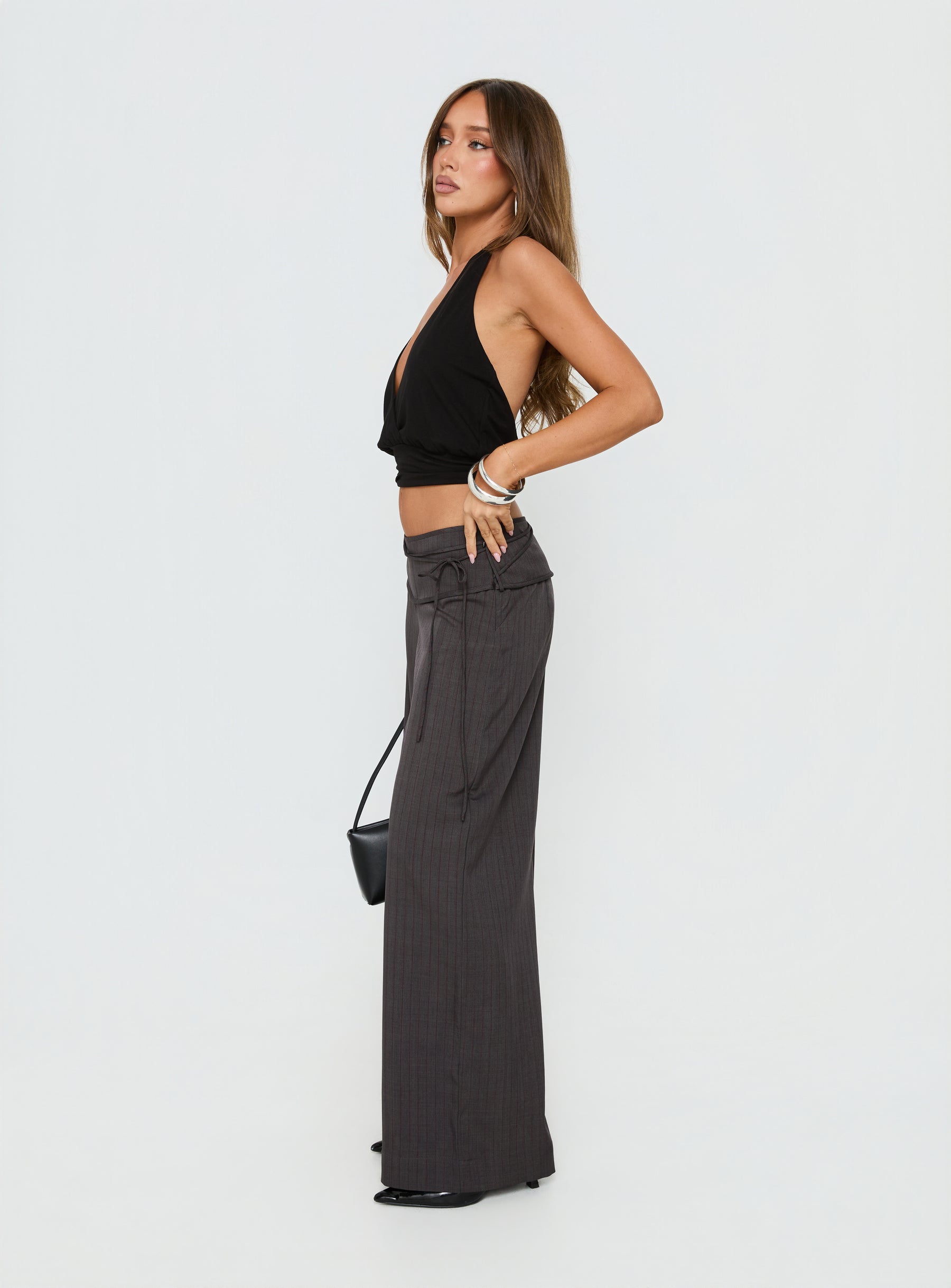side view of model wearing Princess Polly Silver Moon Tie Pants Charcoal Mid Rise Pants 