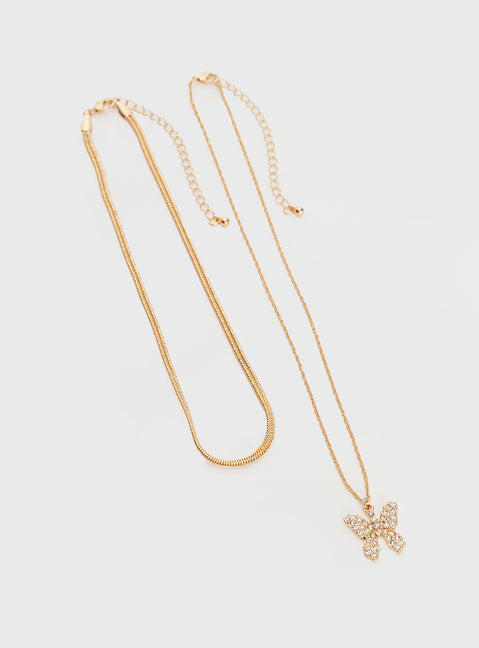 Gold-toned necklace Two separate chains, large charm with diamante detail, lobster clasp fastening