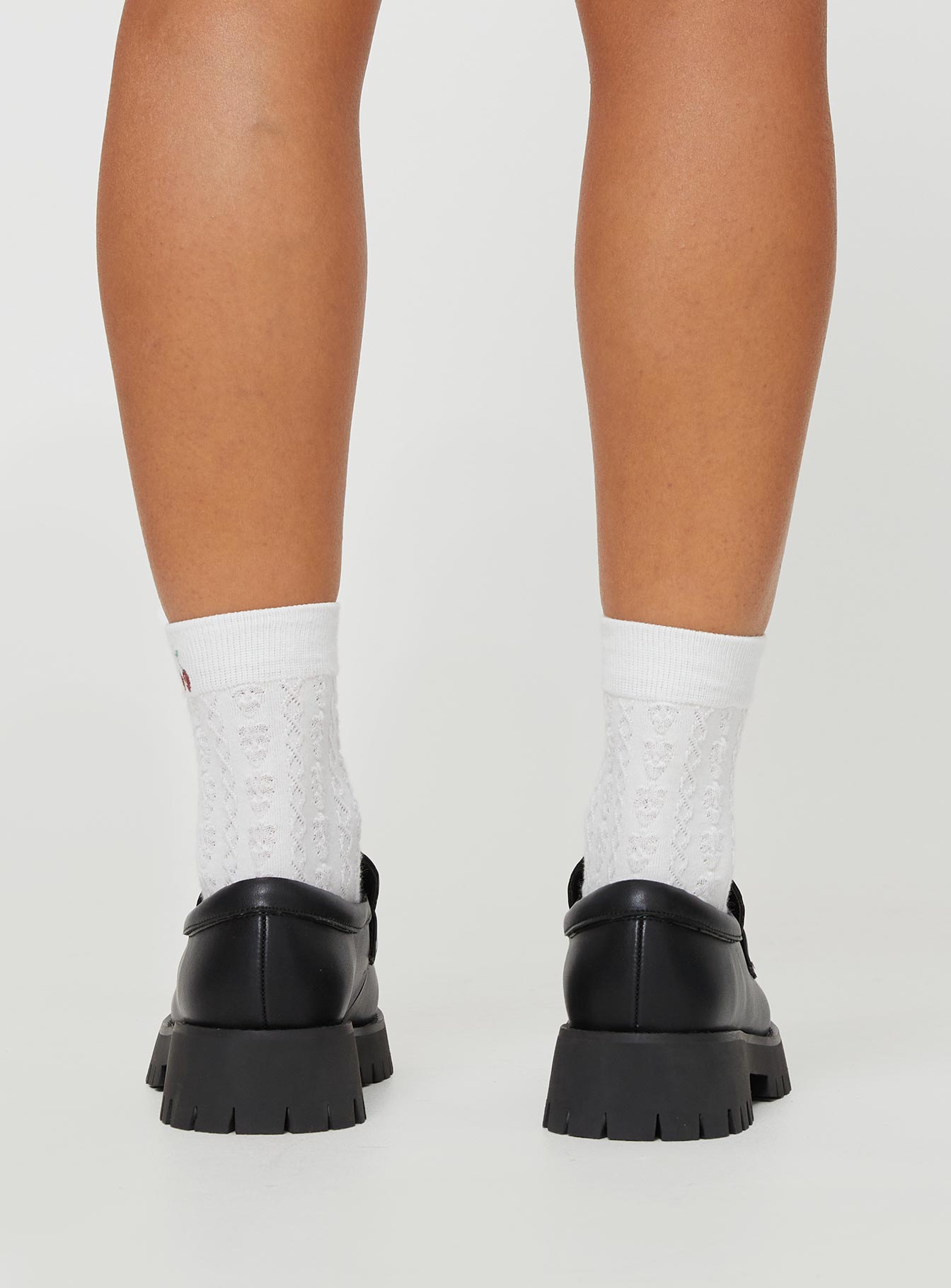 Faux leather platform loafers Slip-on design, padded footbed, treaded sole, rounded toe