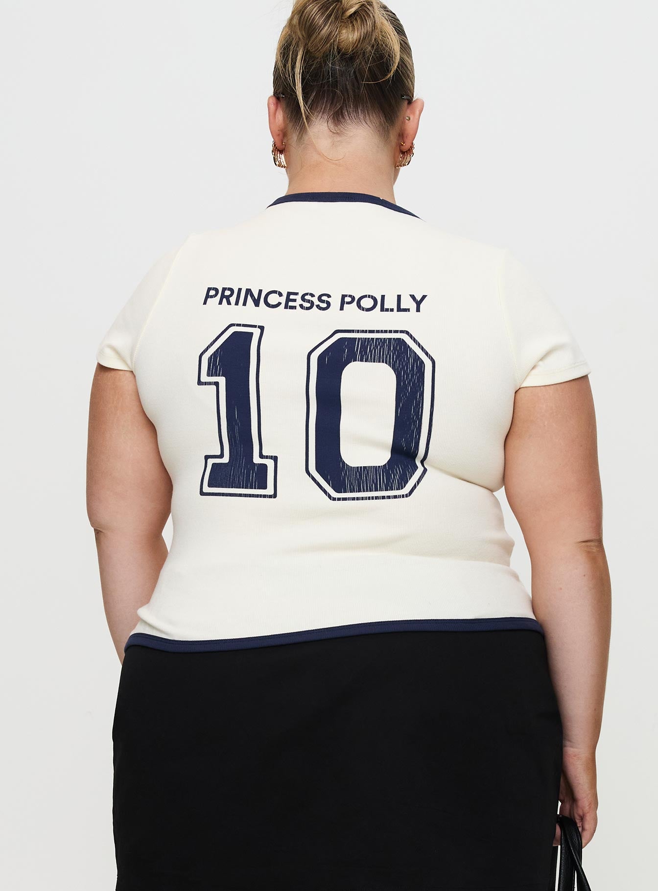 back view of model wearing Princess Polly Track Record Graphic Top Cream Curve Short Sleeves Crew Neck 