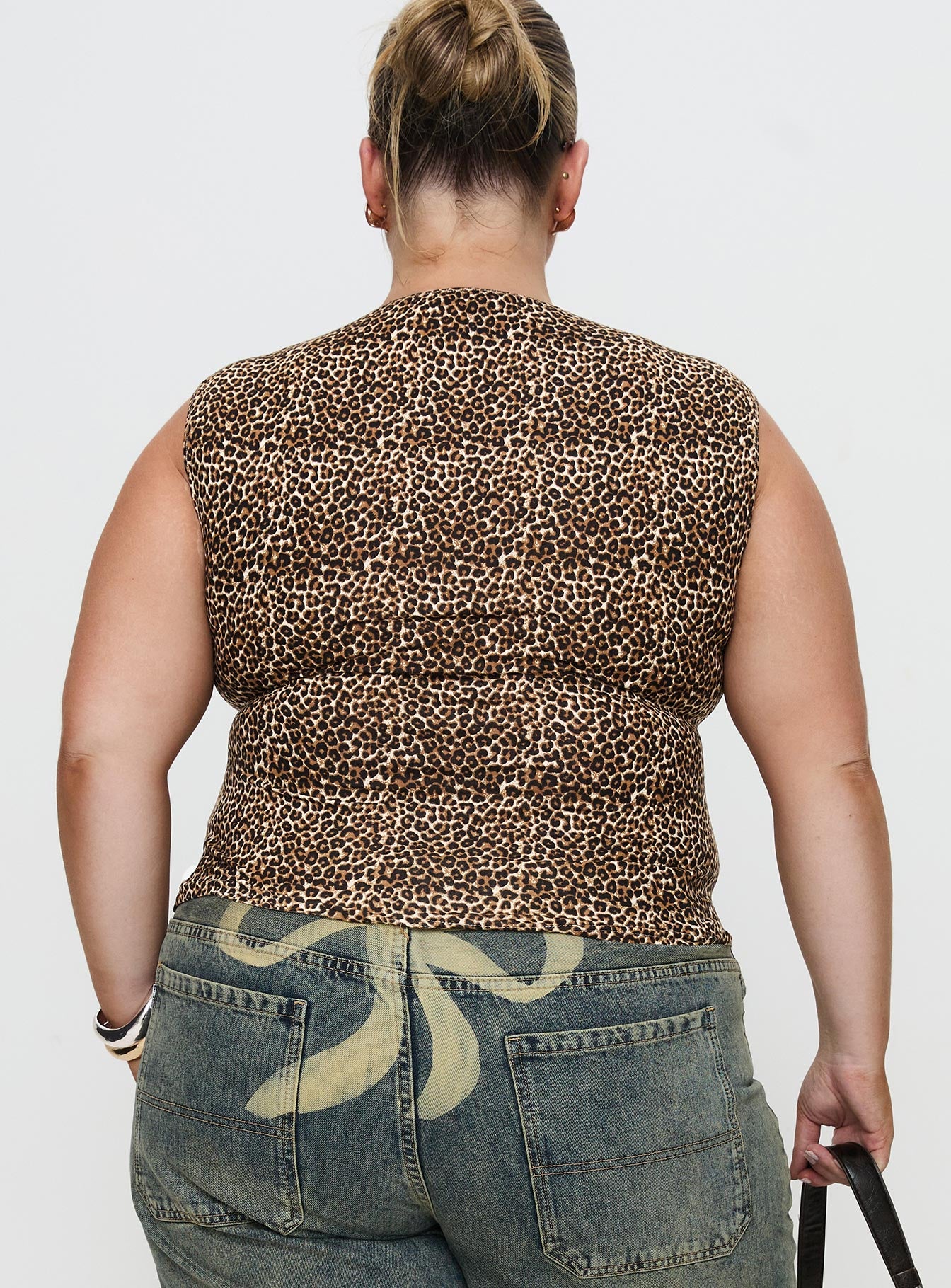 back view of model wearing Princess Polly Lure Top Leopard Curve Sleeveless Crew Neck 
