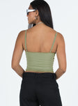 Slim fitting cropped tank top Layered design Fixed halter neck strap Adjustable shoulder straps Good stretch