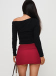 back view of model wearing Princess Polly Meredith Ruched Mini Skirt Red Mini Skirts 