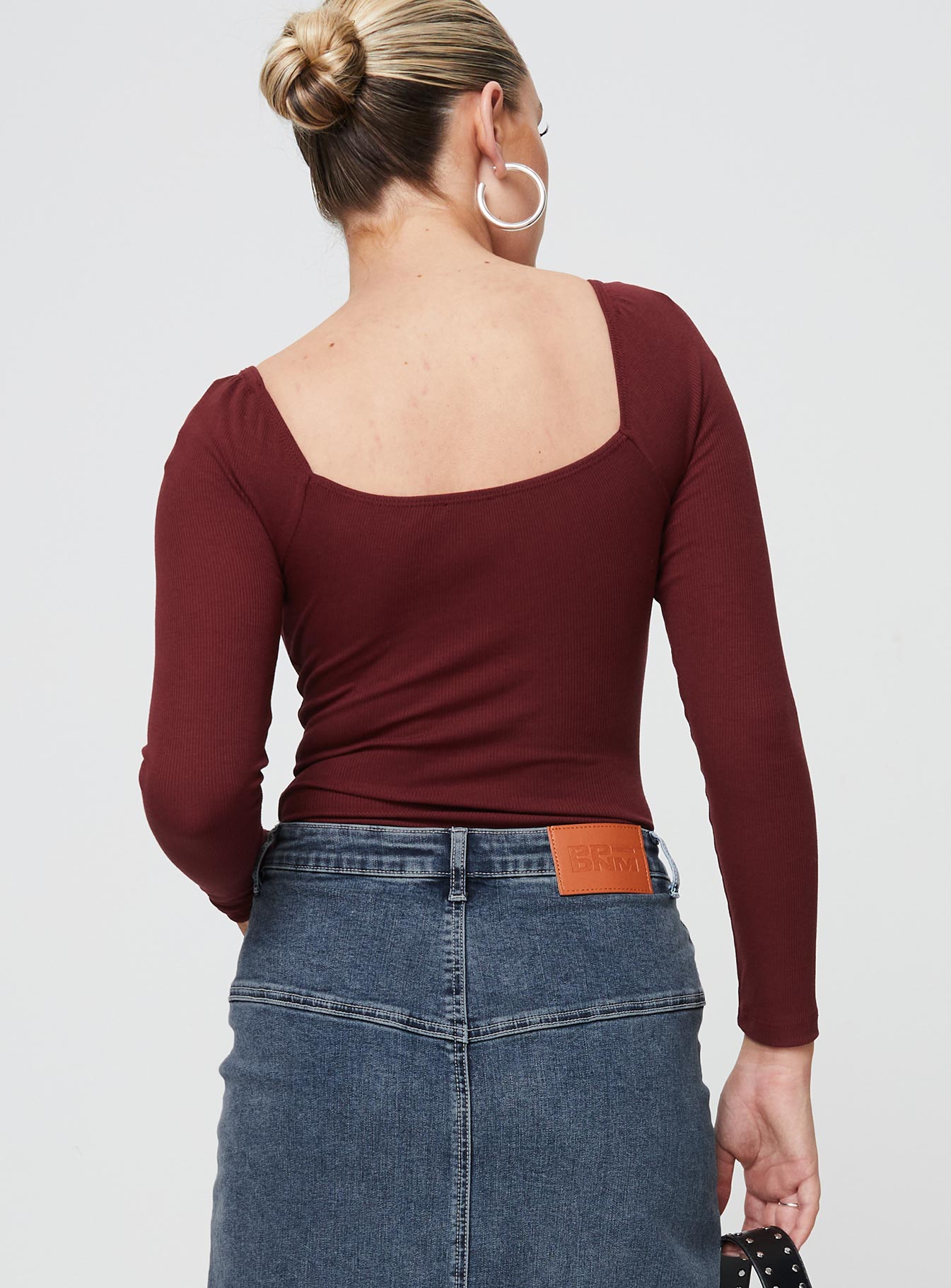 back view of model wearing Princess Polly Charlotte Bodysuit Burgundy Full Sleeves Square Neck 