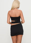 back view of model wearing Princess Polly Headlights Strapless Mini Dress Black Straight Neck 