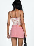 Mini skirt Mid rise Belt looped waist Zip and button fastening Twin hip pockets Branded patch at back