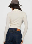 back view of model wearing Princess Polly Slow It Down Long Sleeve Top Cream Full Sleeves High Neck 