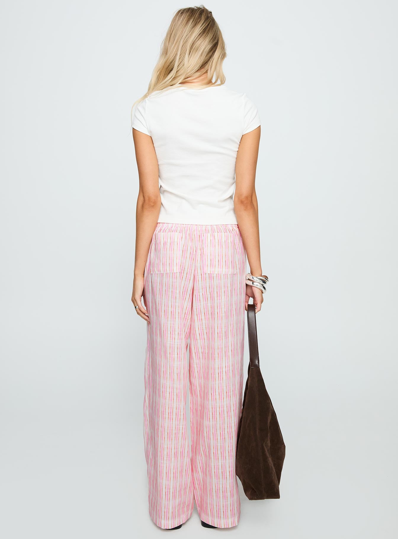 back view of model wearing Princess Polly Beach House Pants Pink Stripe High Waisted Pants 