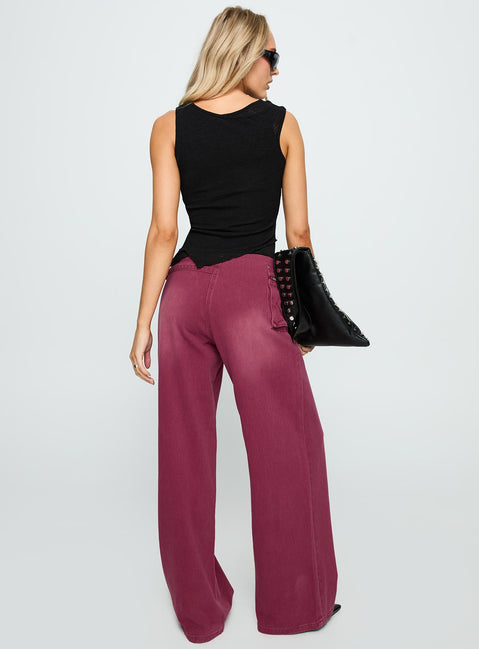 back view of model wearing Princess Polly Paltrow Mid Rise Wide Leg Cargo Jeans Washed Burgundy Mid Rise Jeans 