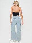 back view of model wearing Princess Polly Handler Cargo Jeans Light Wash Denim High Waisted 