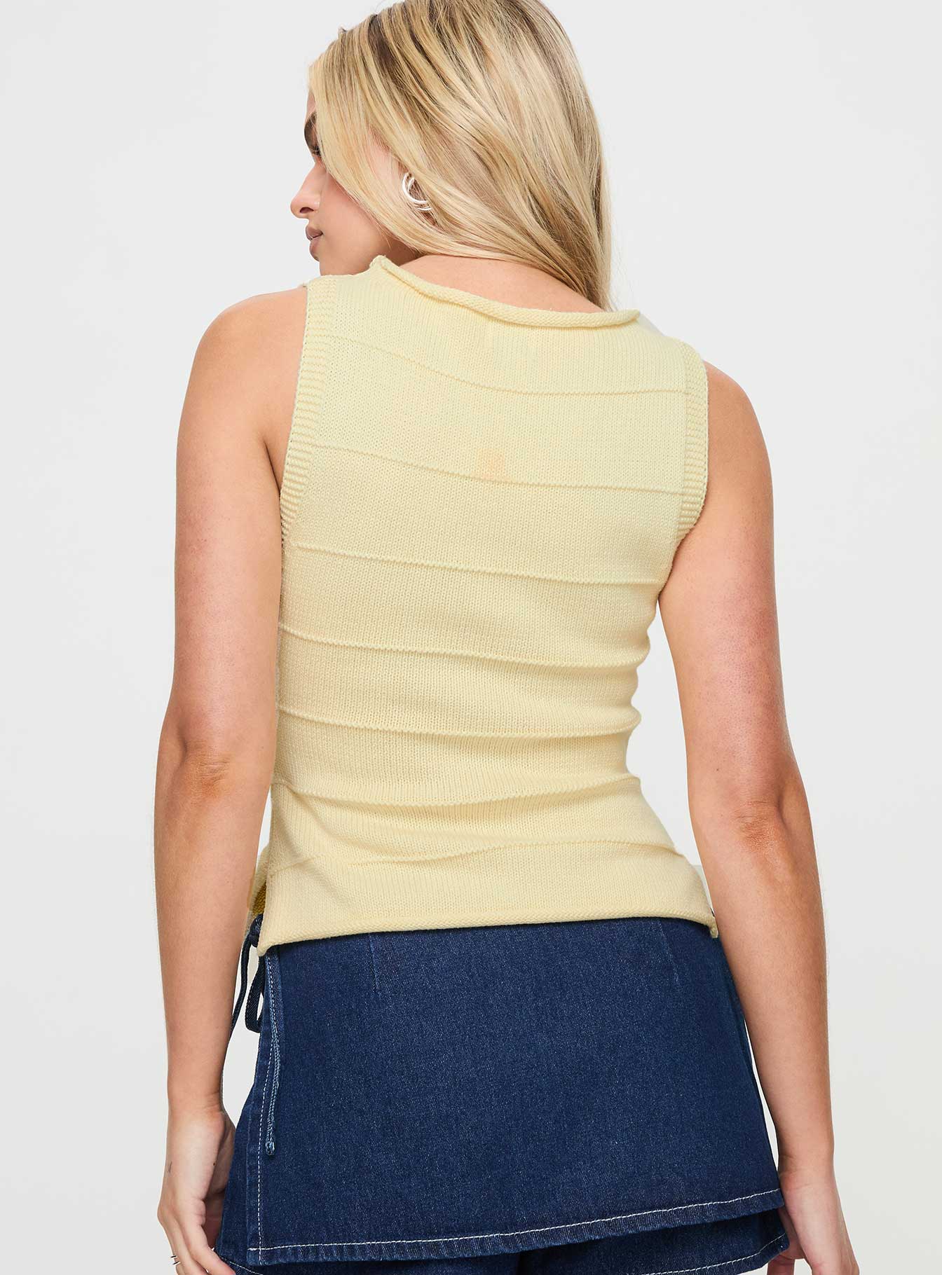 back view of model wearing Princess Polly Hisplane Knit Top Cream Sleeveless Crew Neck 