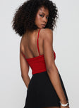 back view of model wearing Princess Polly Lilani Bodysuit Red Sleeveless 