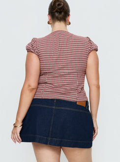 back view of model wearing Princess Polly Warna Low Rise Denim Mini Skirt Dark Wash Curve Mini Skirts 